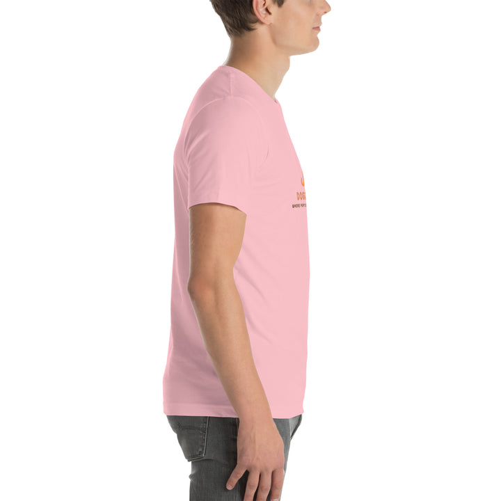 Person wearing a pink t-shirt with text on a white background
