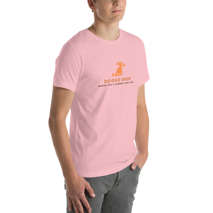 Person wearing a pink t-shirt with doggo shop logo and text on a white background