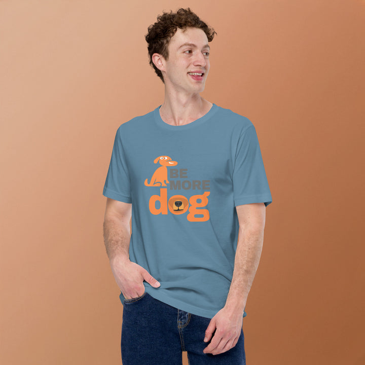 Man wearing a blue t-shirt with orange text and graphic on a brown background
