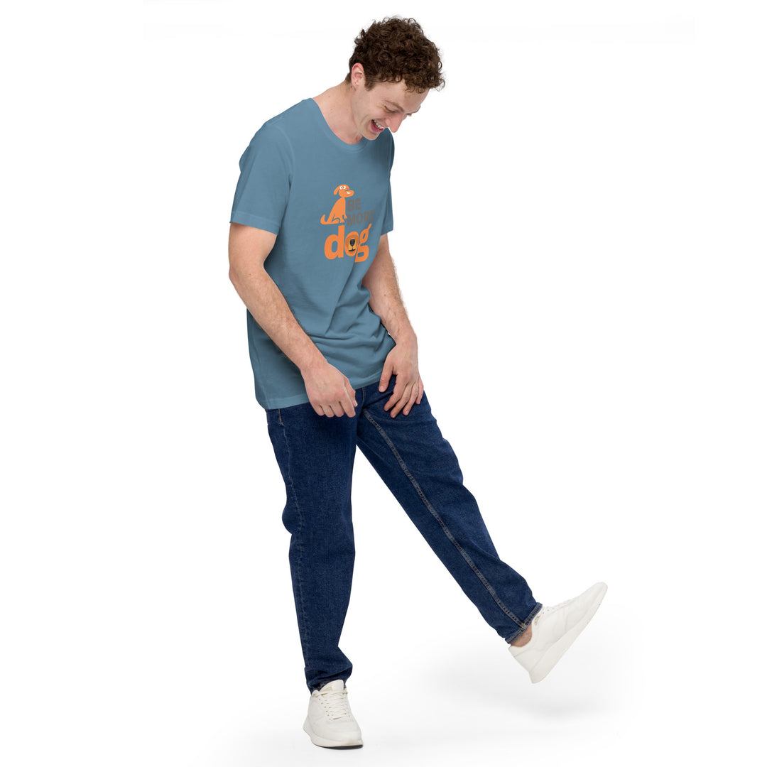 Person wearing a blue t-shirt with an orange logo and text, paired with blue jeans and white sneakers on a white background.