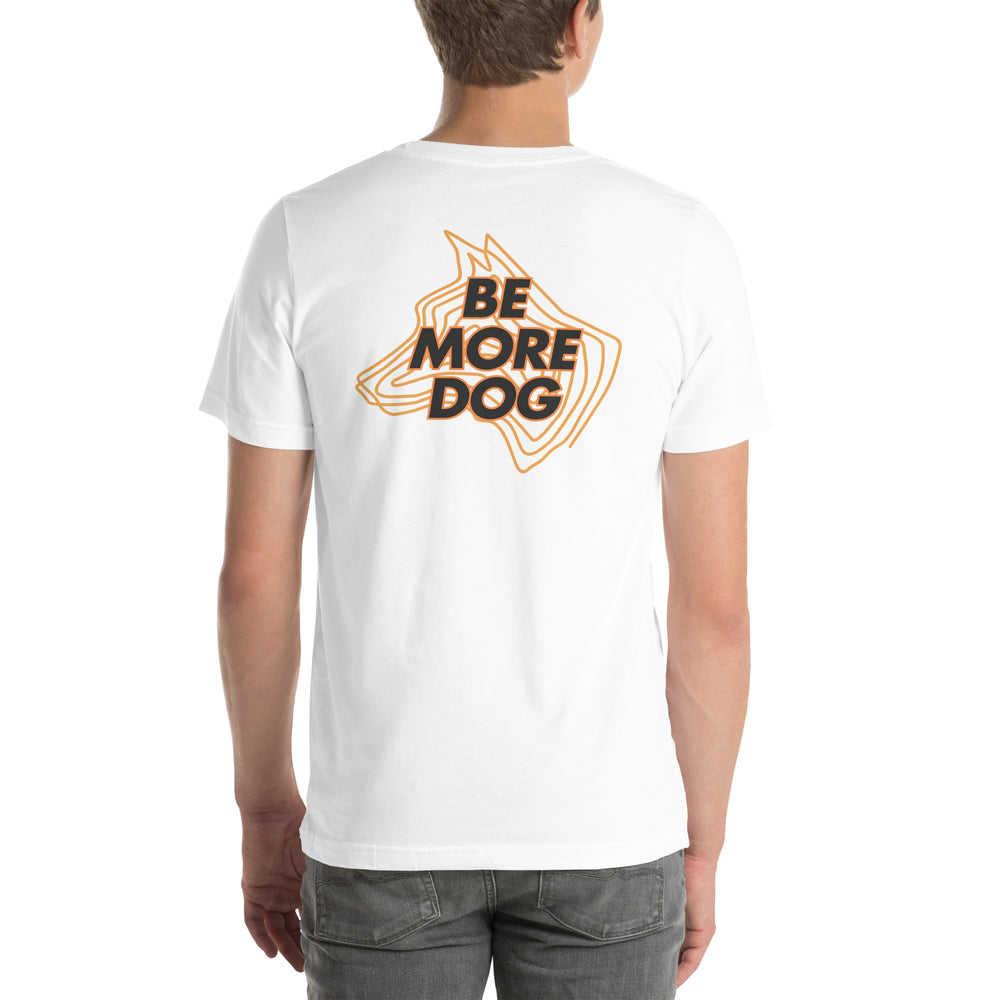 Person wearing a white t-shirt with 'Be More Dog' print on the back