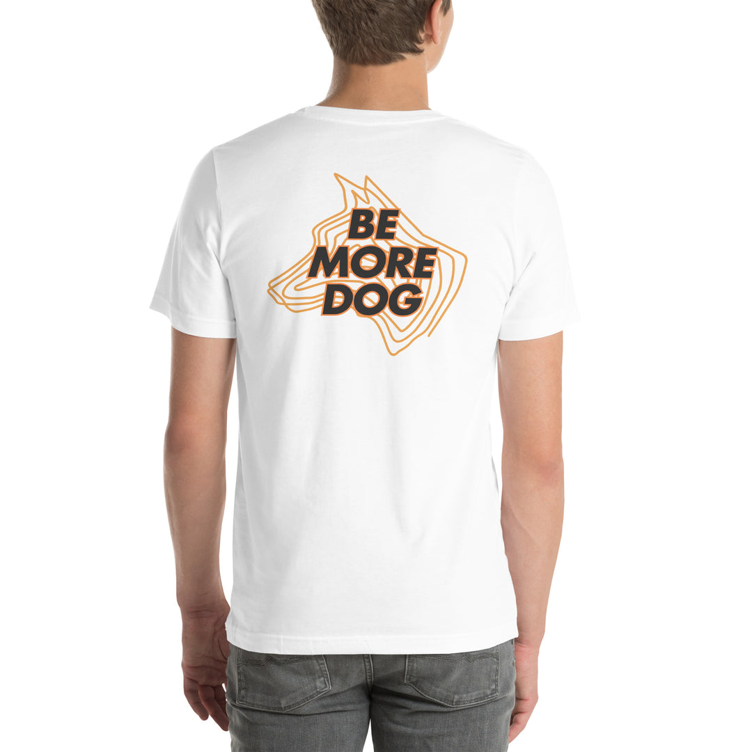 Person wearing a white t-shirt with 'Be More Dog' print on the back