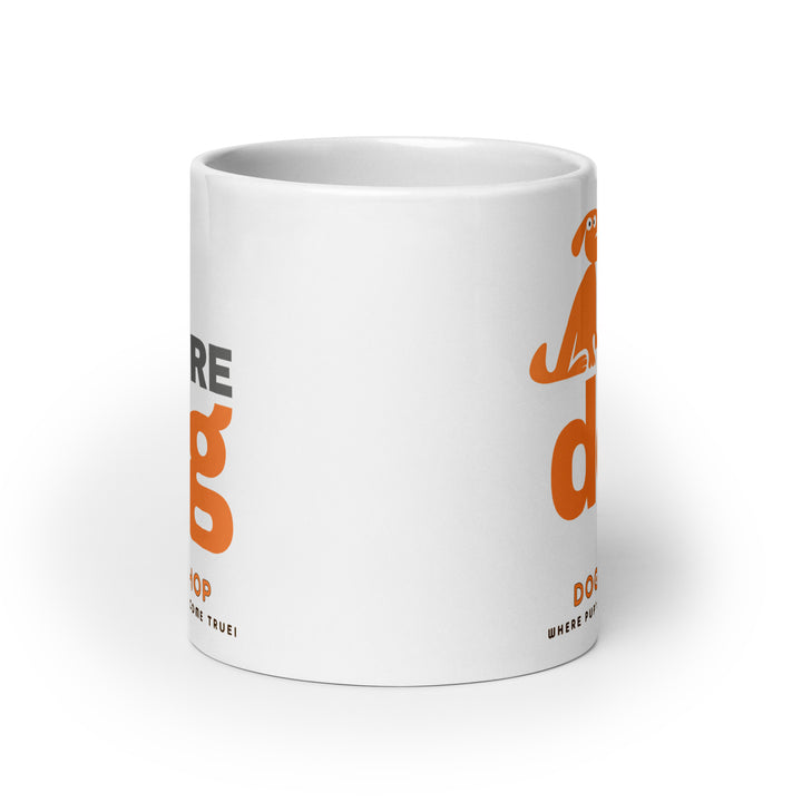 White mug with orange and black text on a white background